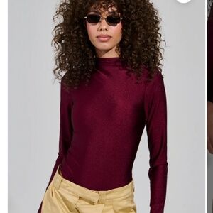 AKIRA PAXTON DISCO LONG SLEEVE MOCK NECK BODYSUIT IN BURGUNDY Size MM
